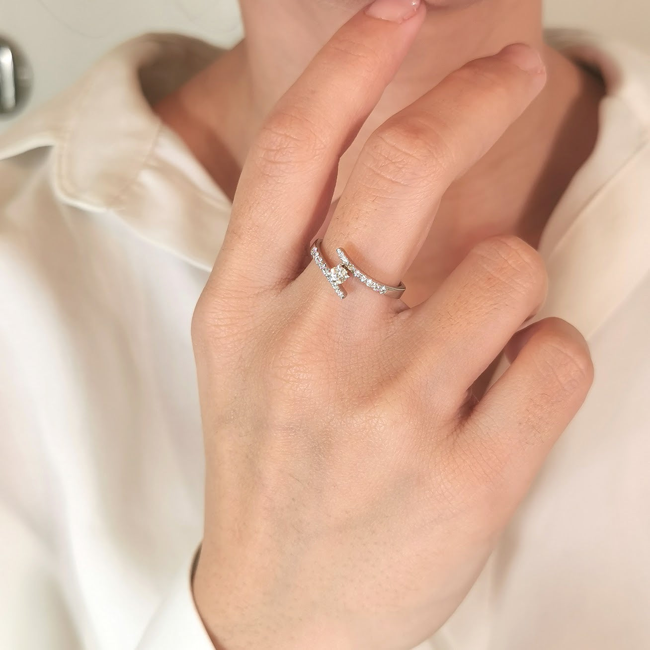 Waved Elegant Solitaire Engagement Ring with Diamonds