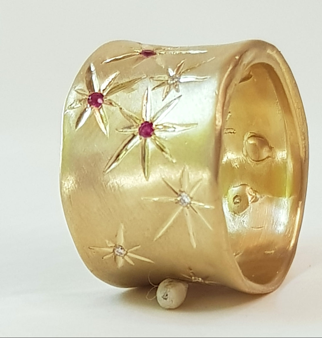 Ethereal 18K Gold Cigar Band Ring Engraved With Stars, Set Diamonds And Rubies