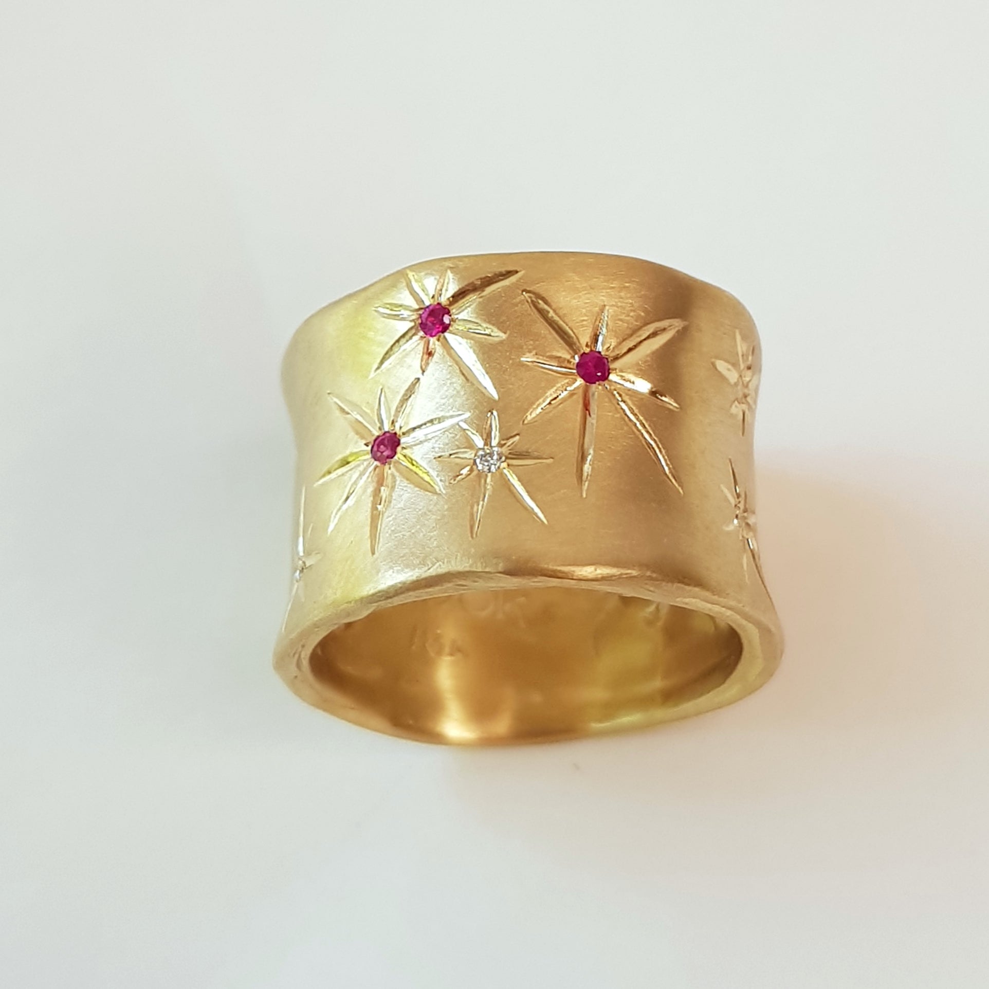 Ethereal 18K Gold Cigar Band Ring Engraved With Stars, Set Diamonds And Rubies