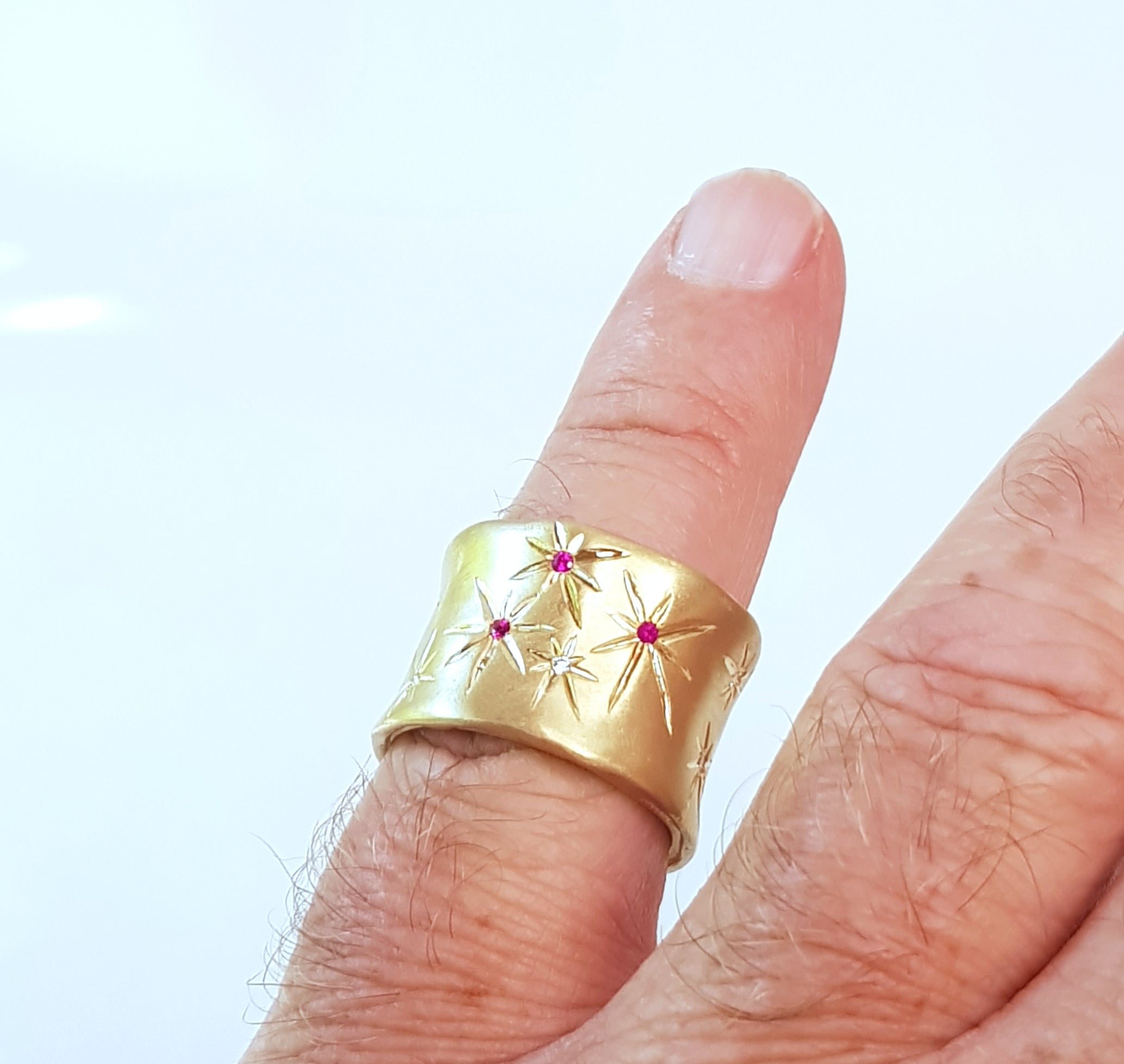 Ethereal 18K Gold Cigar Band Ring Engraved With Stars, Set Diamonds And Rubies