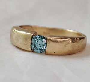 blue diamond gold engagement ring 