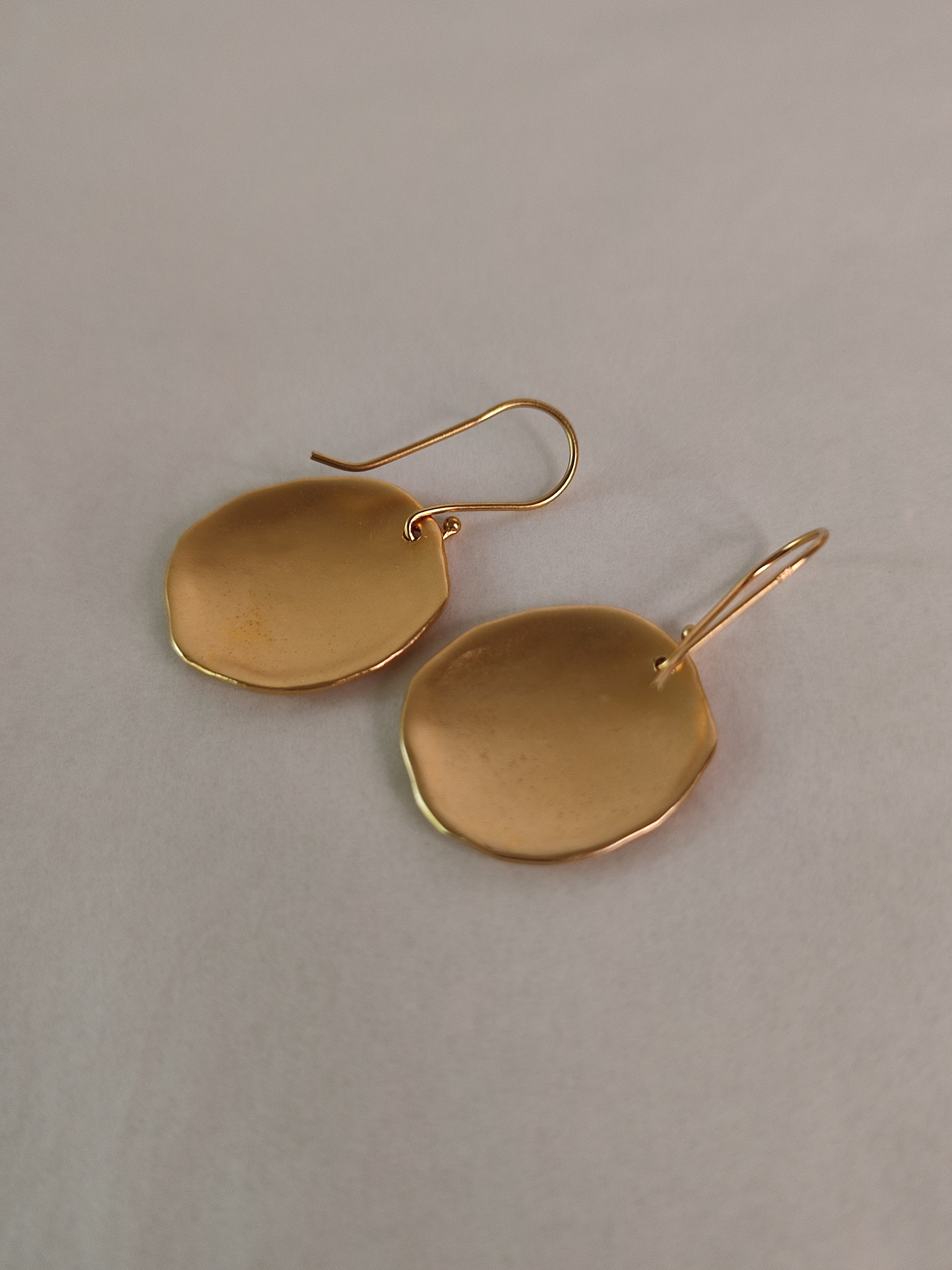 Large Hammered Gold Rimmed Circle Earrings