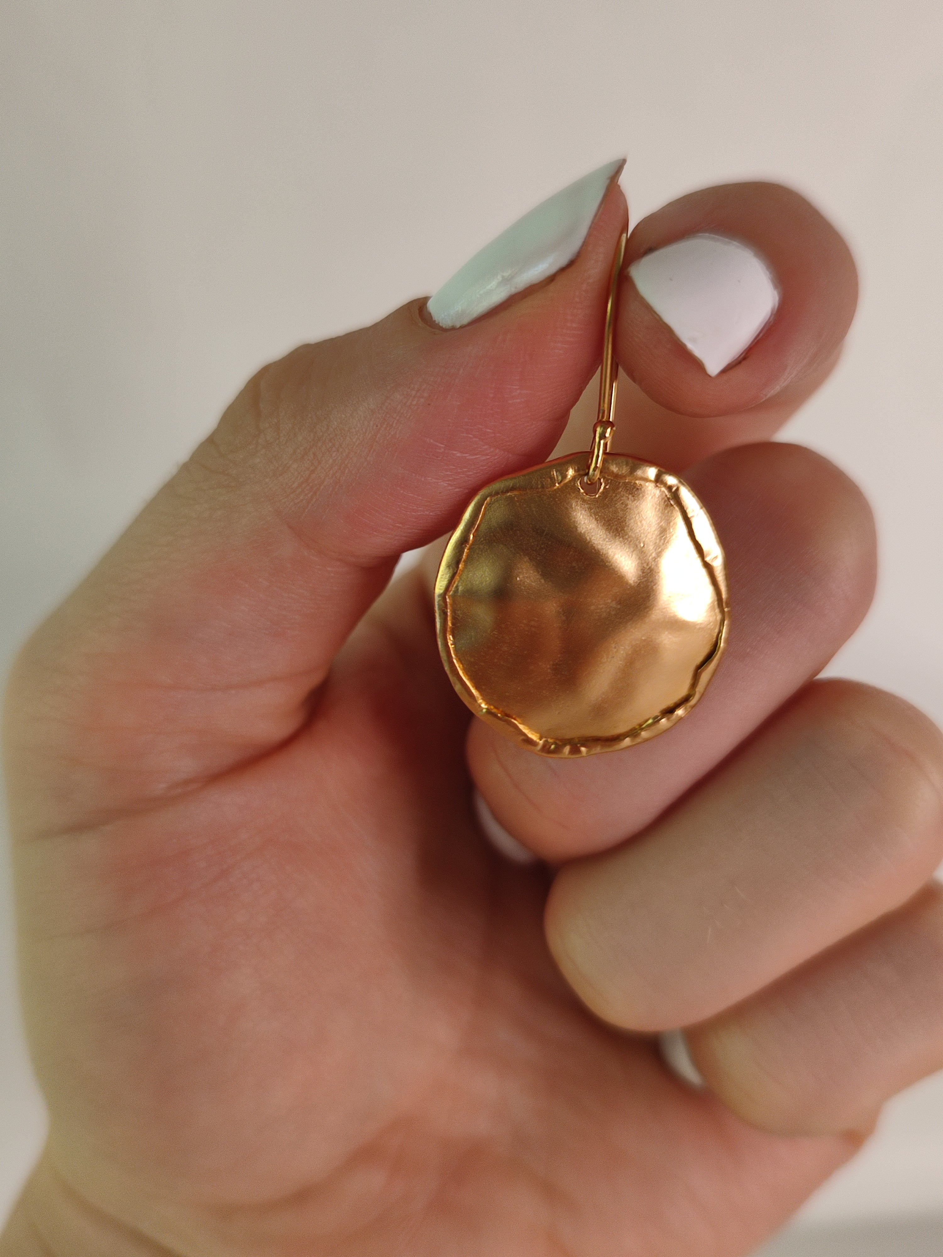 Large Hammered Gold Rimmed Circle Earrings