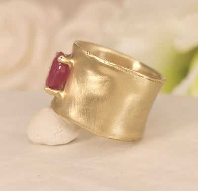 oval ruby cigar band ring