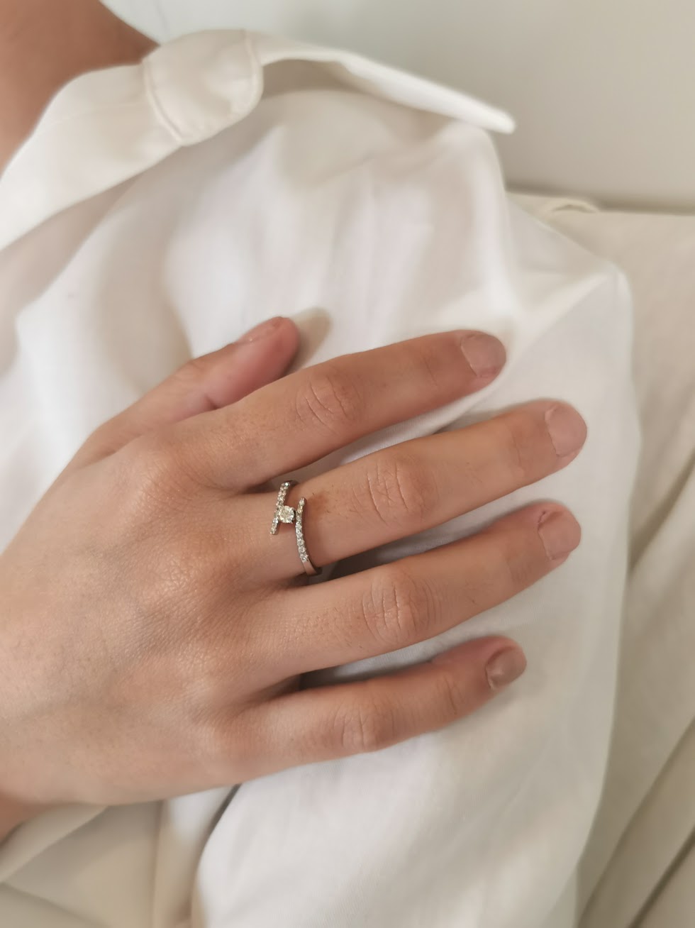 Waved Elegant Solitaire Engagement Ring with Diamonds