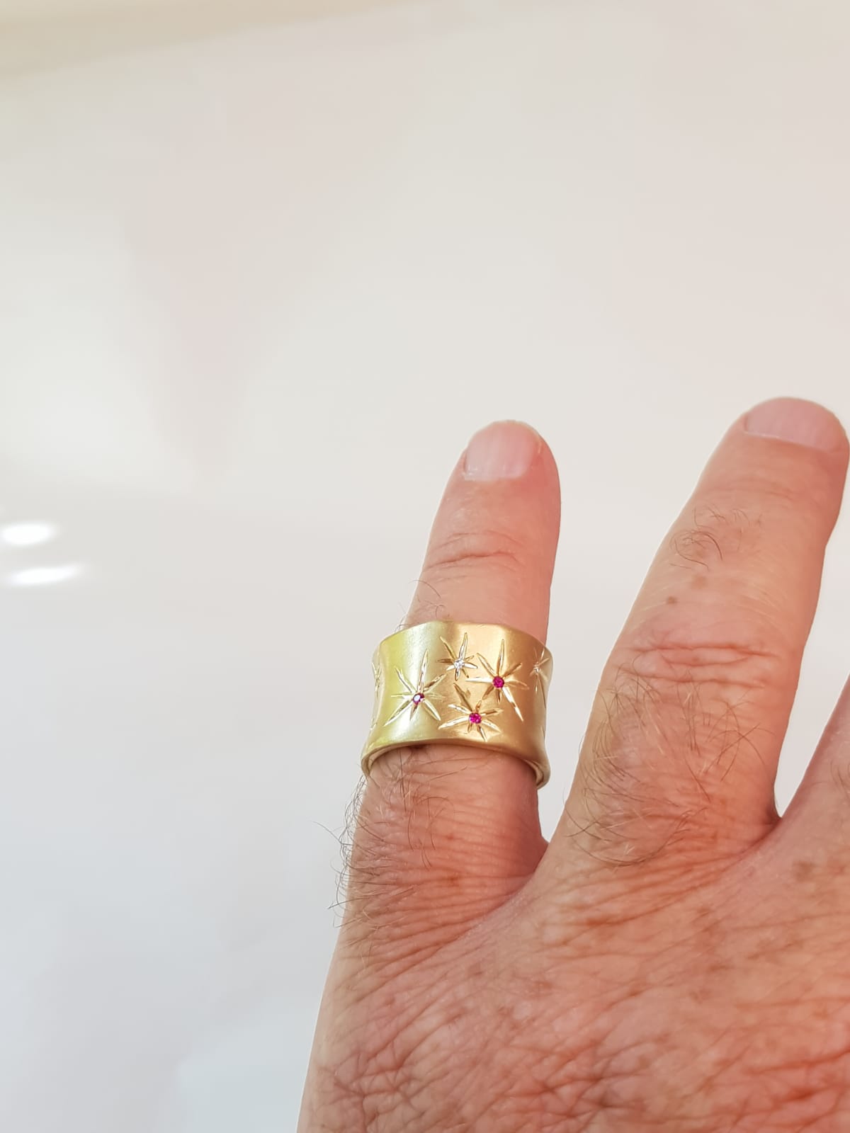 Ethereal 18K Gold Cigar Band Ring Engraved With Stars, Set Diamonds And Rubies