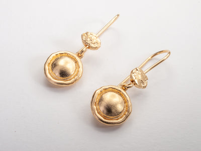 round button gold earrings