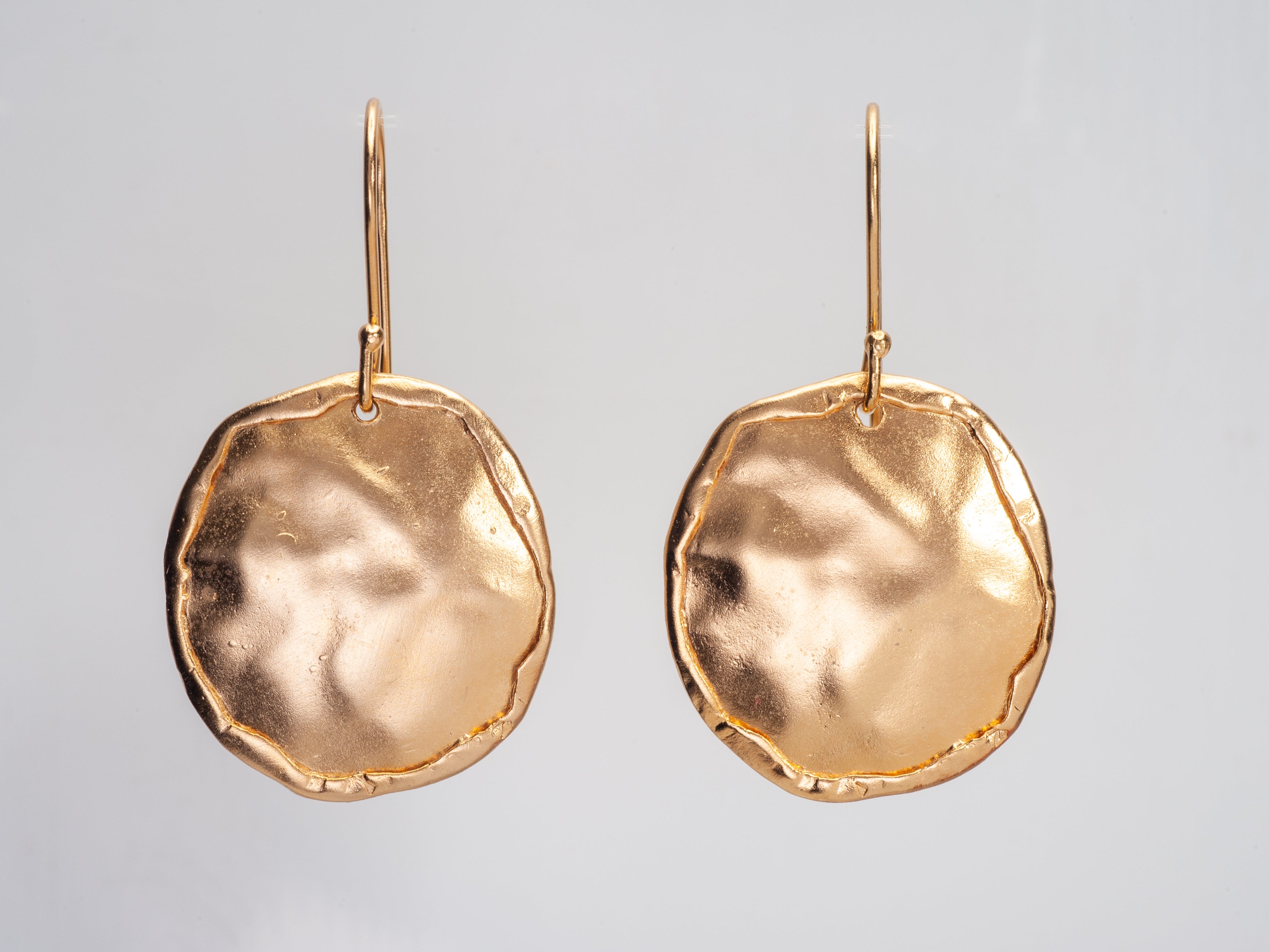 Large Hammered Gold Rimmed Circle Earrings